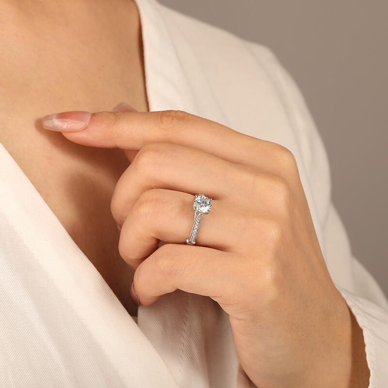 "The Breath From My Angel" Round Cut Side Stone Engagement Ring