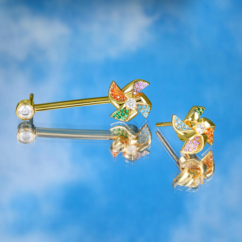 Jeulia Pendientes giratorios asimétricos con colgantes de molinos de colores de plata de ley