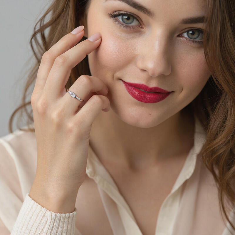 "Lieben und Verehren" Verlobungsring 0,4 ct Radiantschliff Solitär