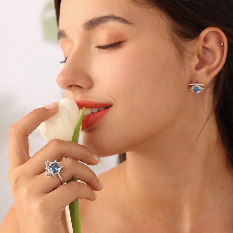 Jeulia "Blue Treasure" Butterfly Knot Radiant Cut Sterling Silver Ring