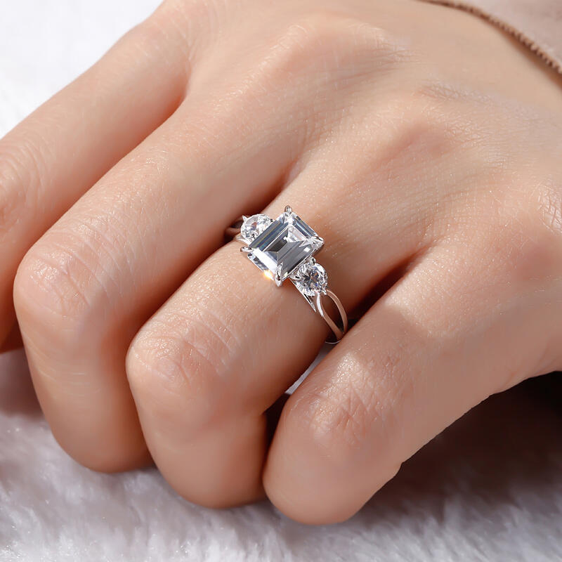 Jeulia Three Stone Split Shank Emerald Cut Sterling Silver Ring