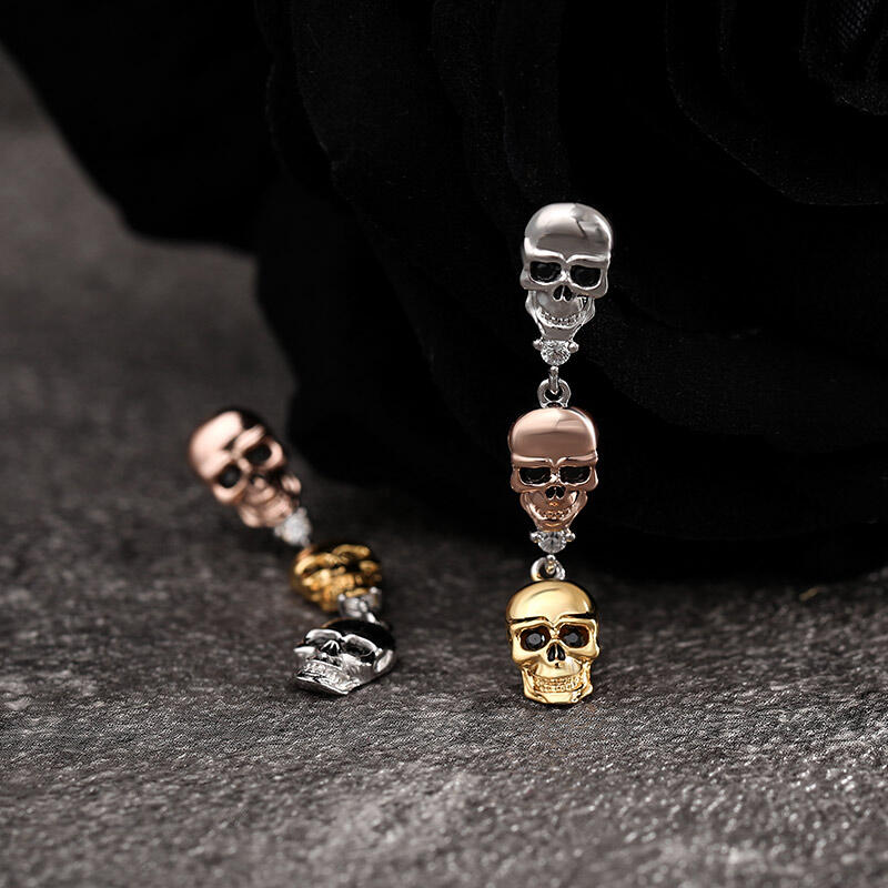 Jeulia Pendientes de calavera tricolor y huesos cruzados en plata de ley