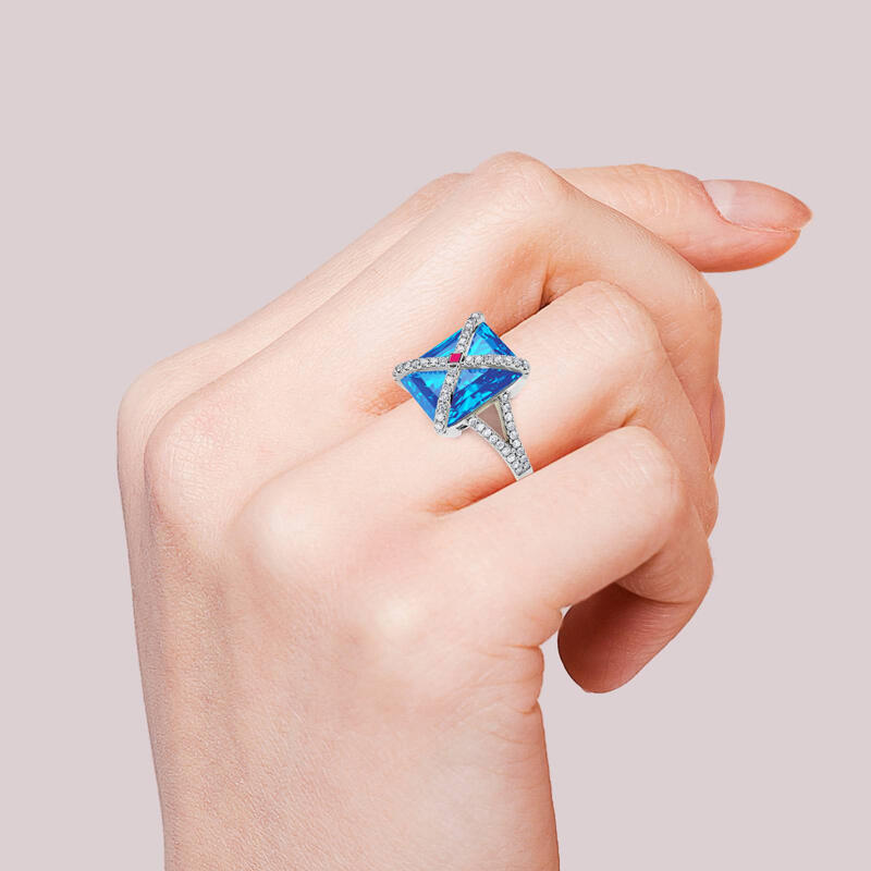 Jeulia Anillo de plata de ley piedra azul con corte de esmeralda