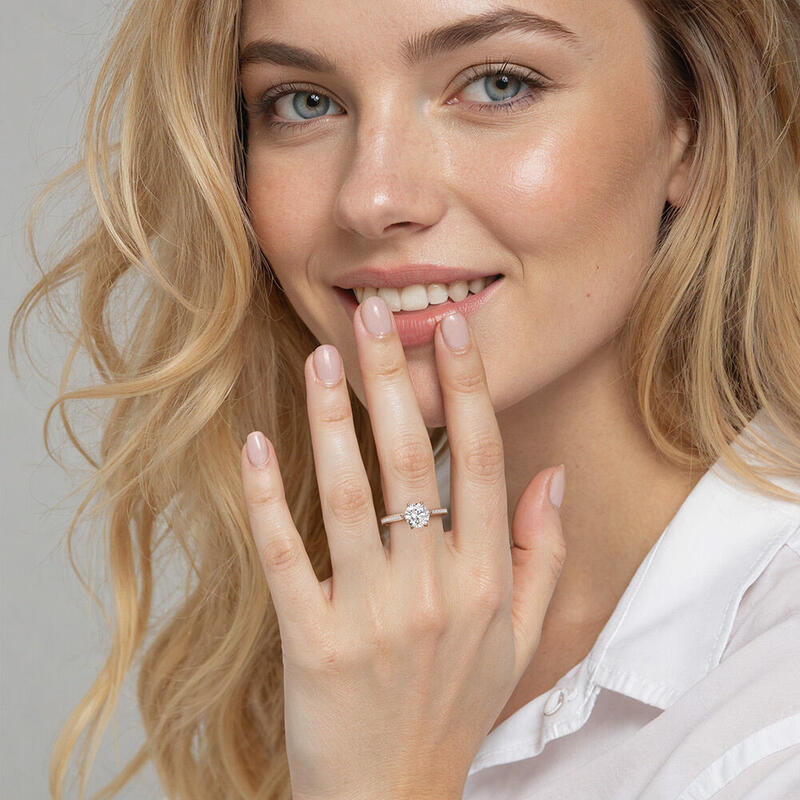 "My Queen" 1.2ct Round Cut Side Stone Engagement Ring