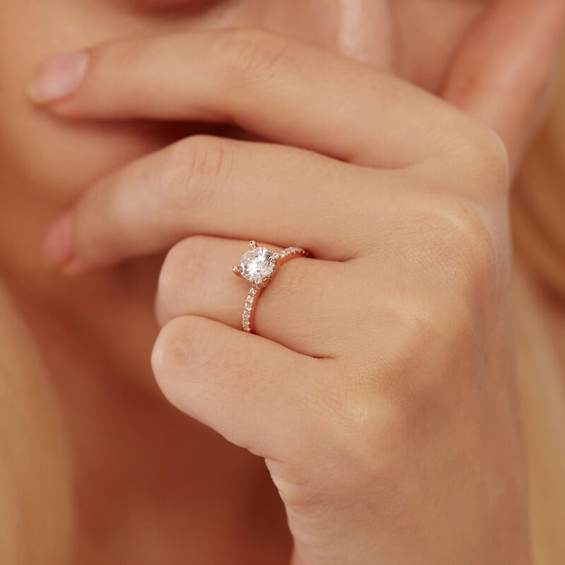 "The Story Of Our Lives" Round Cut Side Stone Engagement Ring
