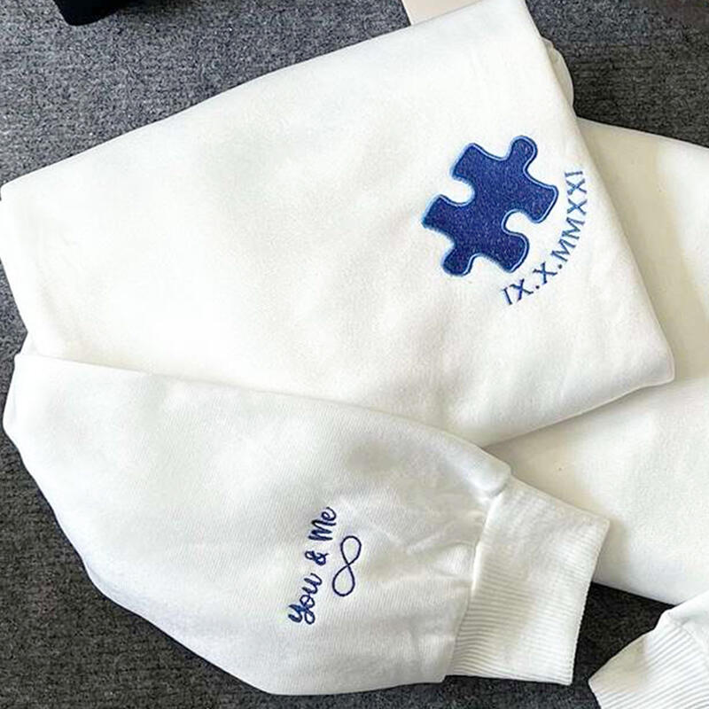 Sweatshirt personnalisé brodé d'un coeur et d'un puzzle avec date en chiffres romains pour l'anniversaire de l'amoureux