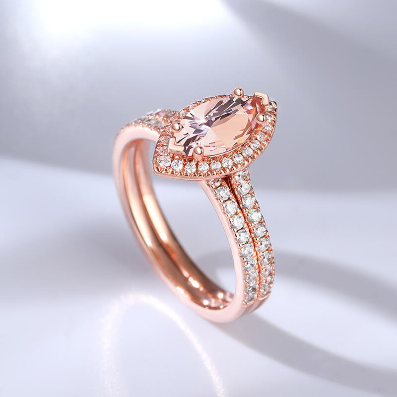 Jeulia Juego de Anillos de Plata de Ley con Morganita Sintética de Corte Marquesa con Halo