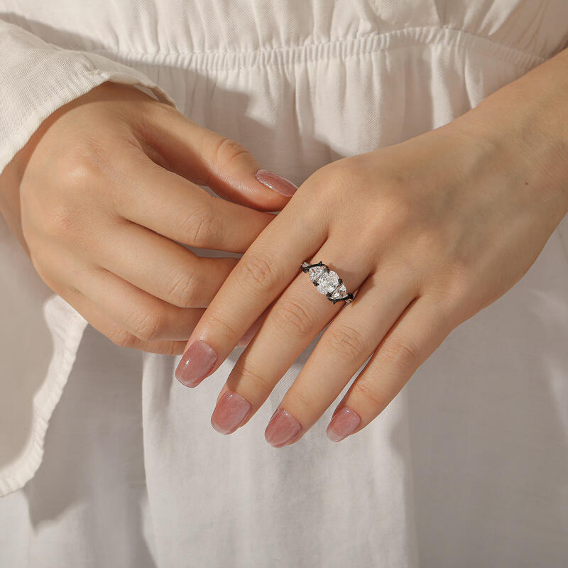 Jeulia Dark Thorns Two Tone Three Stone Engagement Ring with Twist Band