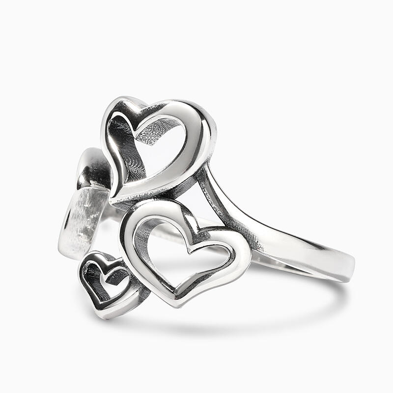 Jeulia Anillo abierto de plata de ley con cuatro corazones lindos