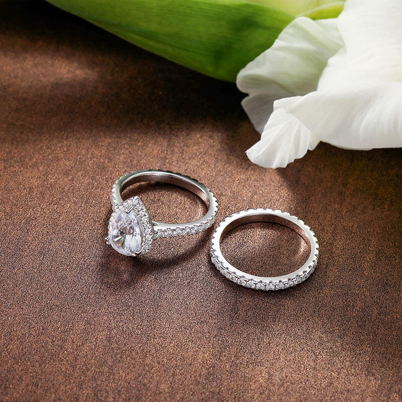 Jeulia Conjunto De Anillos De Eternidad De Plata Esterlina Con Talla Pirifoeme Con Halo