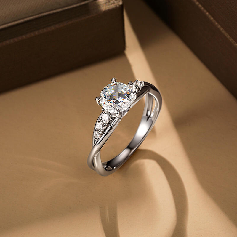 Jeulia Classic Twist Round Cut Engagement Ring with Side Stone