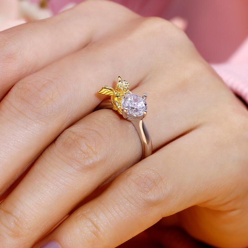 Jeulia anillo de compromiso de ángel con alas lindas de plata corte redondo