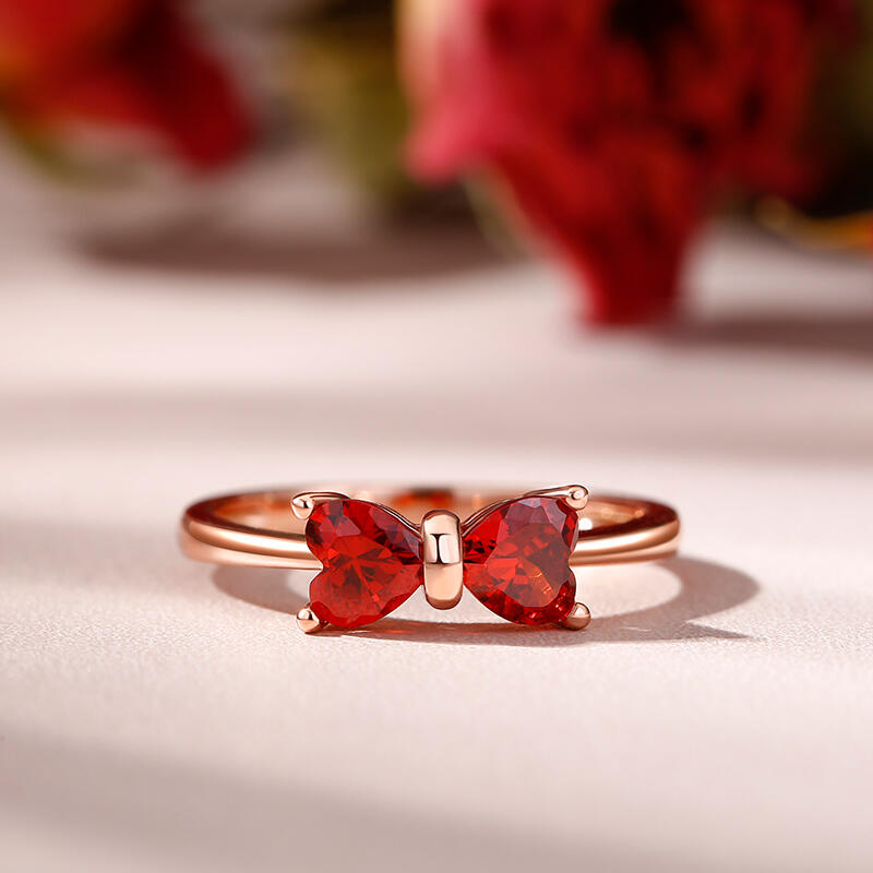 Jeulia Anillo de plata de ley con corte de corazón y lazo rojo