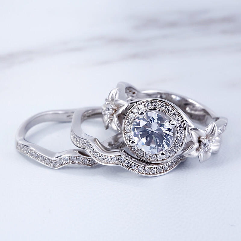 Jeulia Terno de anéis florais de corte redondo em prata de lei