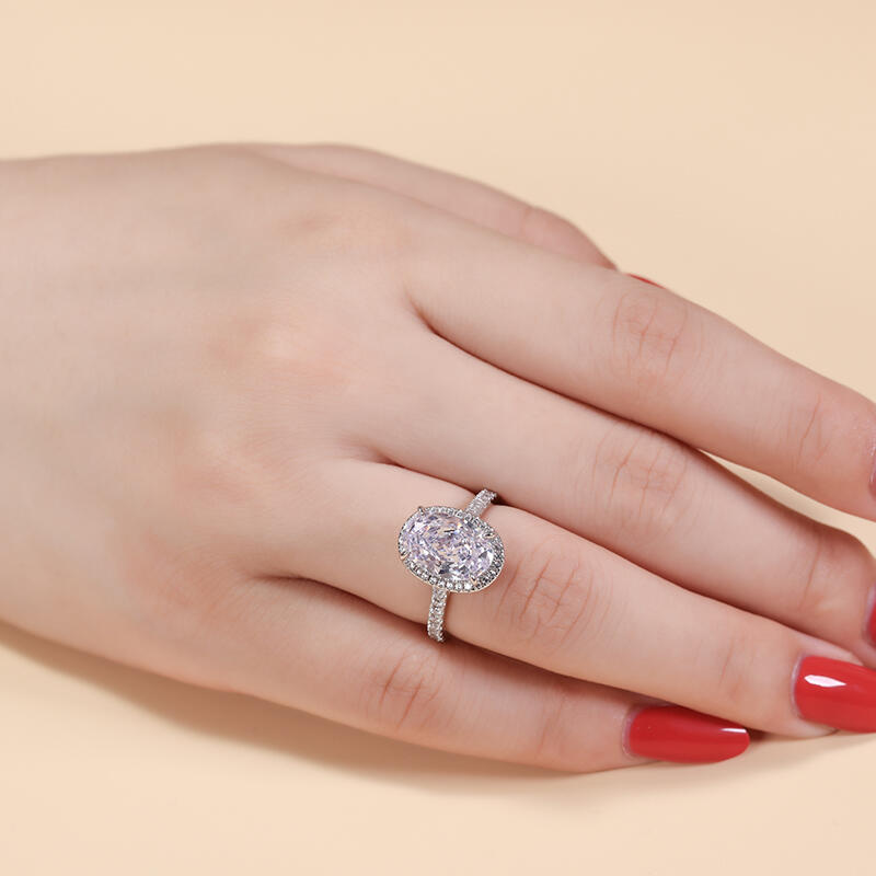 Jeulia Anillo de Compromiso Clásico de Halo Ovalado de Plata