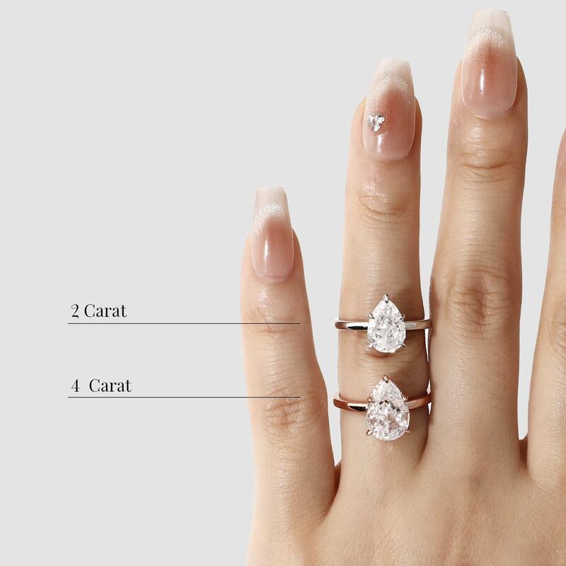 "Promise Me Forever" 2ct Pear Cut Side Stone Engagement Ring