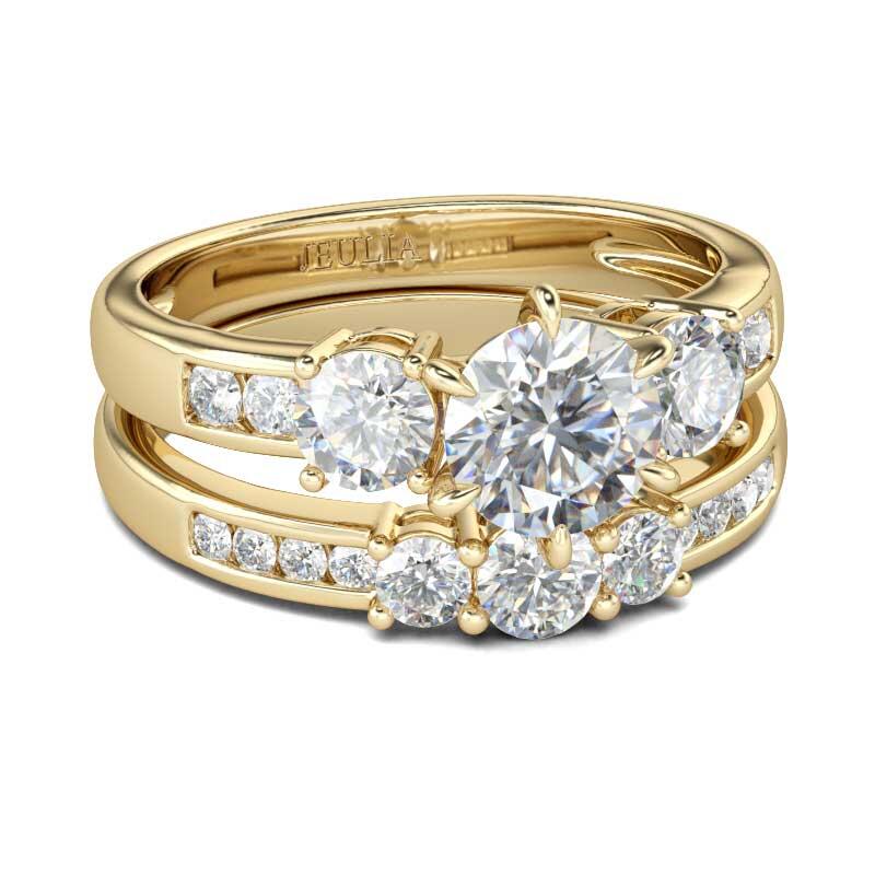 Jeulia Conjunto De Anillos De Tono Oro Con Tres Piedras De Talla Redonda En Plata De Ley