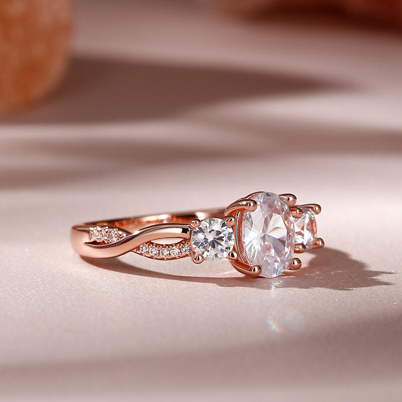 Jeulia 10K/14K/18K Gold Platinum Twist Three Stone Oval Cut Ring