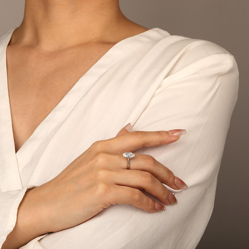 "Edge of Time" Marquise Cut Solitaire Engagement Ring