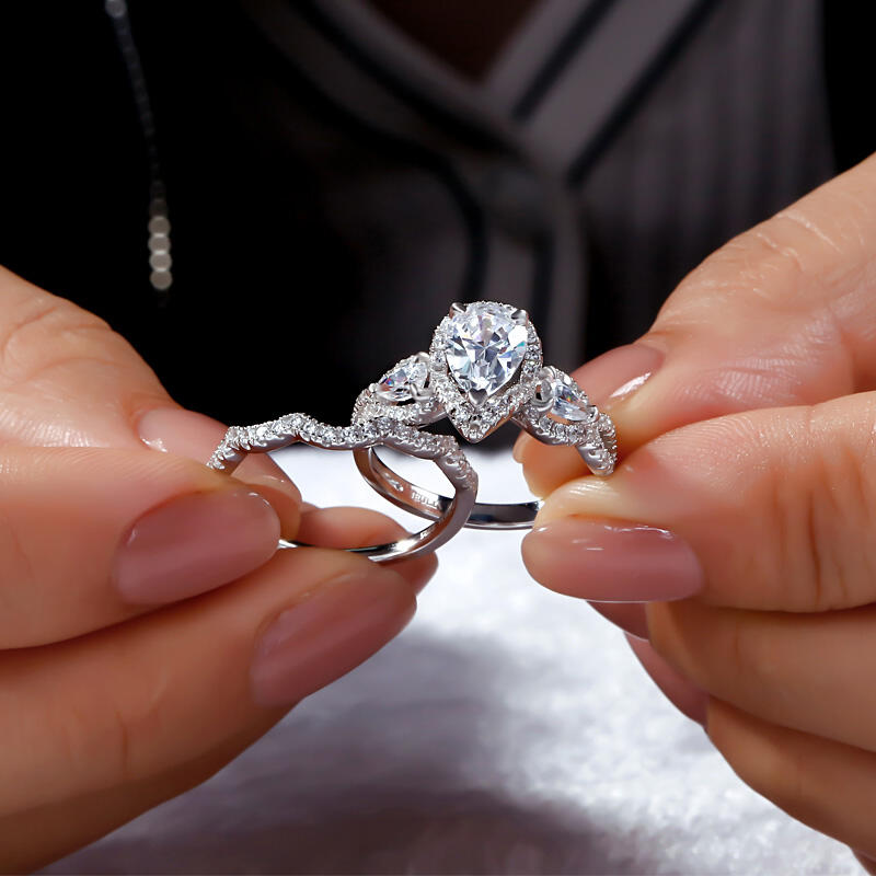 Jeulia Three Stone Twist Pear Cut Sterling Silver Ring Set