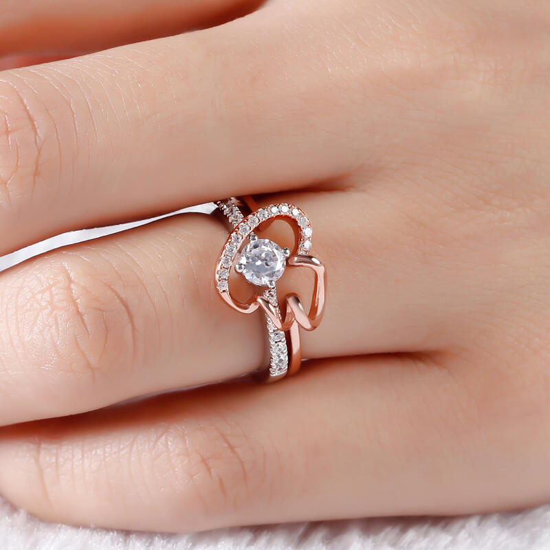 Jeulia Conjunto De Anillos Entrelazados Con Dos Tonos De Talla Redonda En Plata De Ley