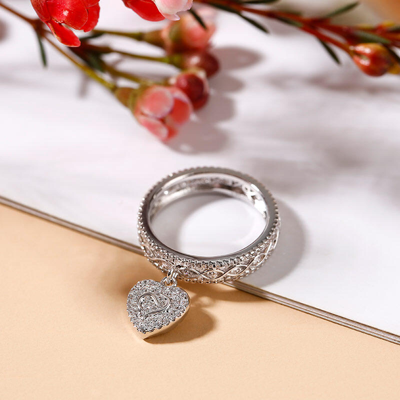 Jeulia Logo Shape Commemorative Heart Twist Sterling Silver Ring