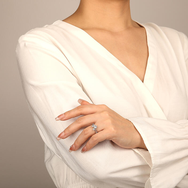 "Genuine Passion" Round Cut Side Stone Engagement Ring