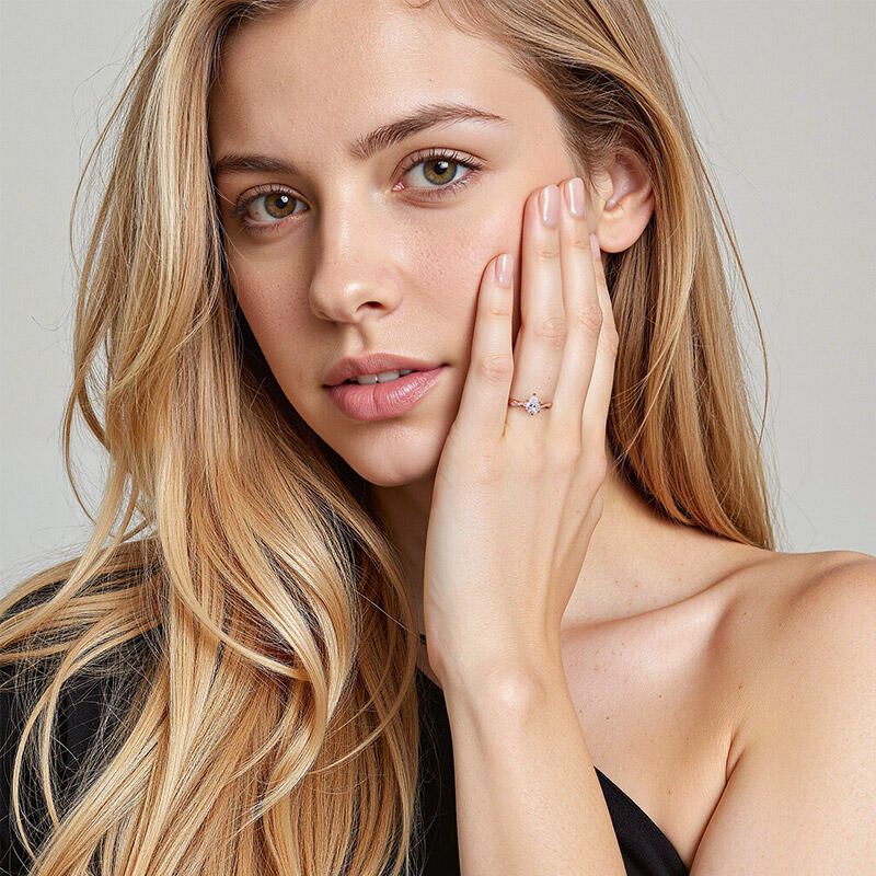 "Ehrenwort" Verlobungsring 0,8 ct Birnenschliff mit Seitensteinen