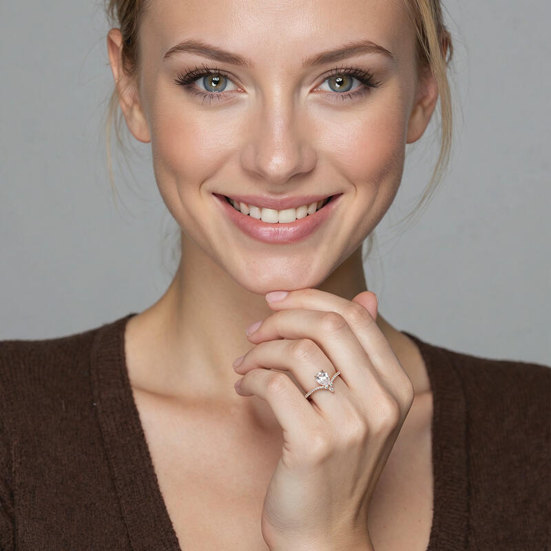 "A Drop Of Memories" Pear Cut Side Stone Engagement Ring