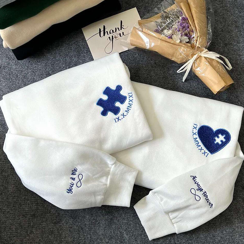 Sweatshirt personnalisé brodé d'un coeur et d'un puzzle avec date en chiffres romains pour l'anniversaire de l'amoureux