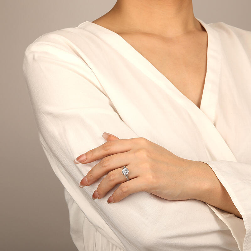 "With Your Love" Round Cut Side Stone Engagement Ring