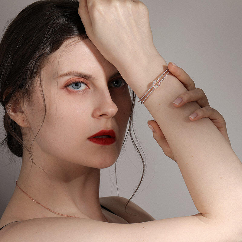 Jeulia Knot Design Sterling Silver Bangle Bracelet