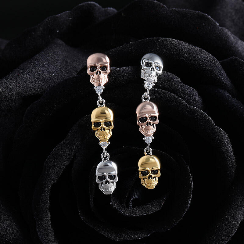 Jeulia Pendientes de calavera tricolor y huesos cruzados en plata de ley