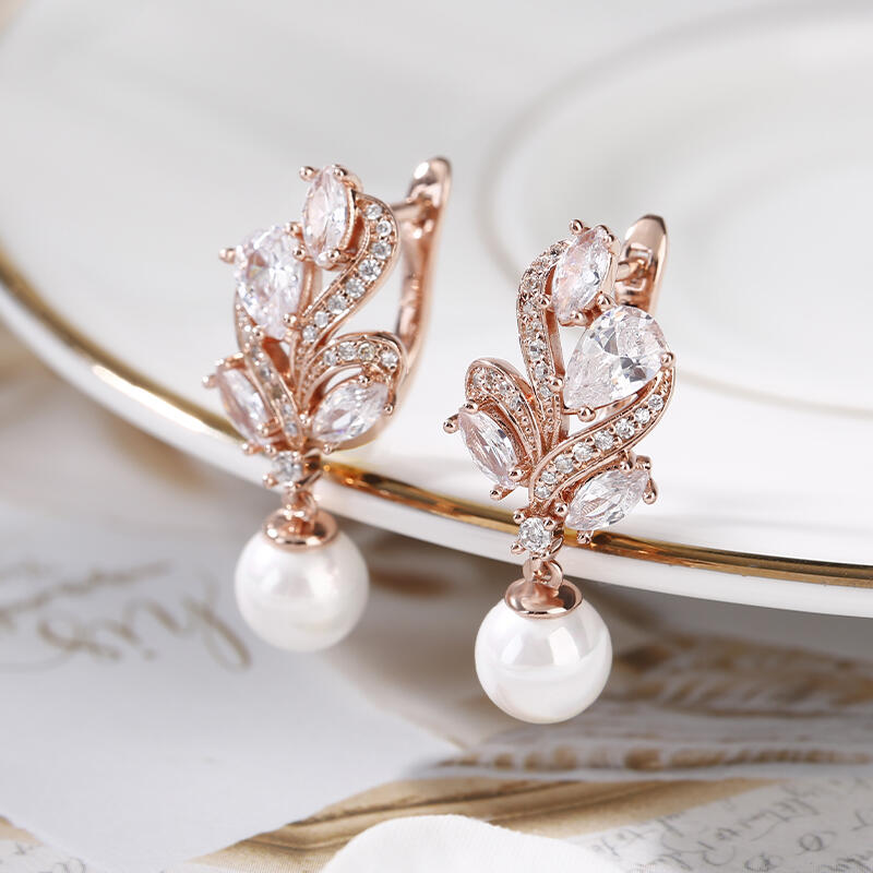 Jeulia Aretes de plata de ley con perlas cultivadas de diseño elegante