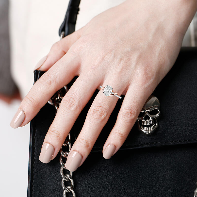 "Forever Right Now" Oval Cut Side Stone Engagement Ring