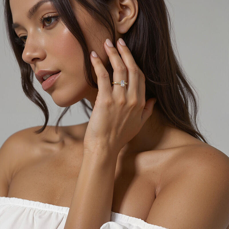 "Strenge & Sanftheit" Verlobungsring 0,8 ct Radiant-Schliff mit Seitensteinen