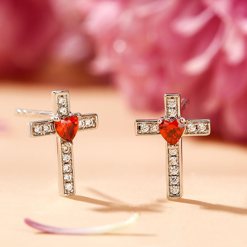 Jeulia Pendientes en plata de ley con diseño en forma de corazón y cruz