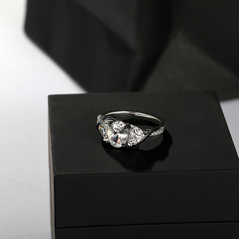 Jeulia Dark Thorns Two Tone Three Stone Engagement Ring with Twist Band