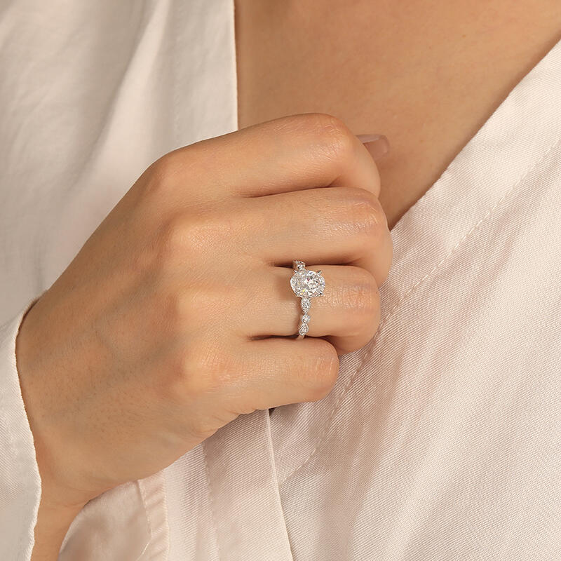 "I'll Be There" Oval Cut Side Stone Engagement Ring