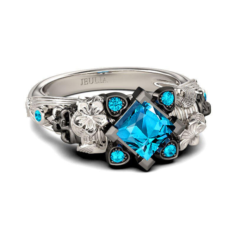 Jeulia Flower Design Princess Cut Sterling Silver Two Skull Ring