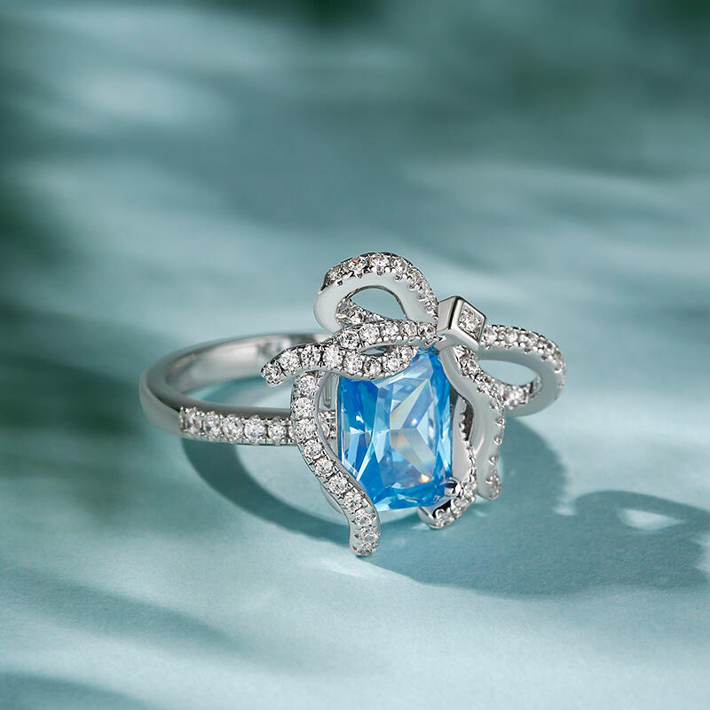 Jeulia "Blue Treasure" Butterfly Knot Radiant Cut Sterling Silver Ring