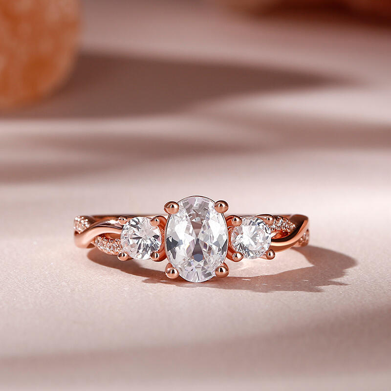 Jeulia 10K/14K/18K Gold Platinum Twist Three Stone Oval Cut Ring