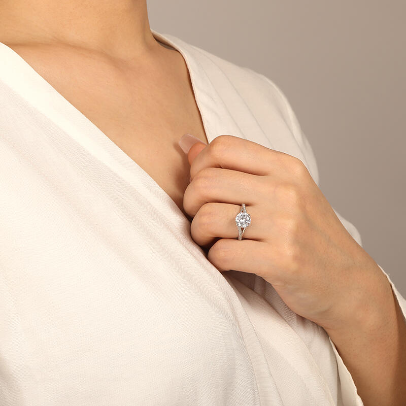 "With Your Love" Round Cut Side Stone Engagement Ring