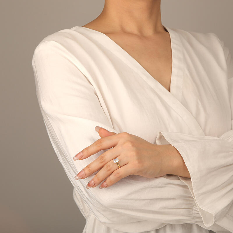 "Captivating Serenity" Emerald Cut Side Stone Engagement Ring