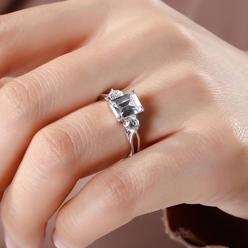 Jeulia Three Stone Split Shank Emerald Cut Sterling Silver Ring