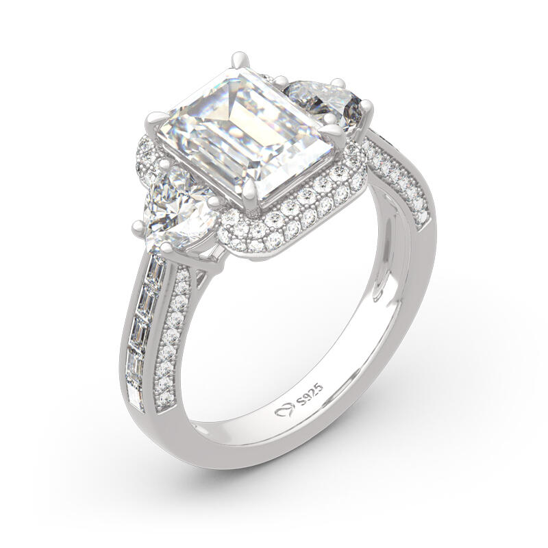 Jeulia Anillo de plata de ley de corte esmeralda con tres piedras de halo