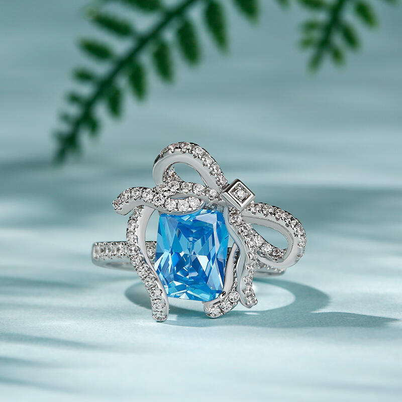Jeulia "Blue Treasure" Butterfly Knot Radiant Cut Sterling Silver Ring