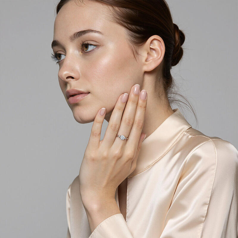 "You're The Only One" Round Cut Three Stone Engagement Ring