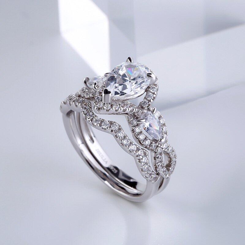 Jeulia Three Stone Twist Pear Cut Sterling Silver Ring Set