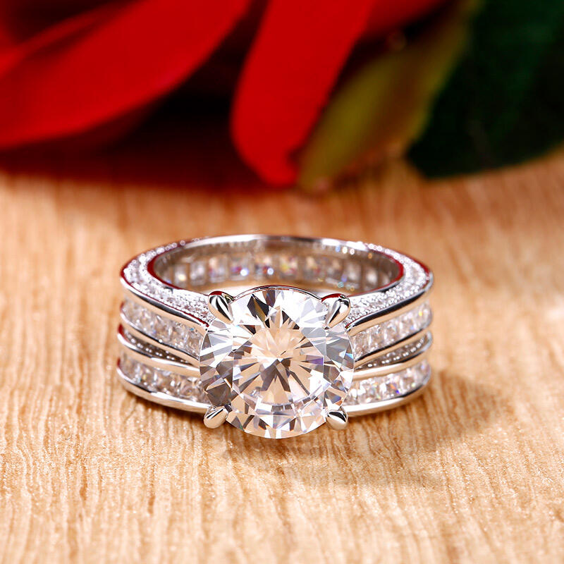 Jeulia Conjunto De Anillos De Eternidad De Plata Esterlina De Tres Lados De Corte Redondo